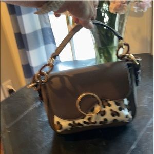 Small NWOT crossbody with synthetic Leopard face